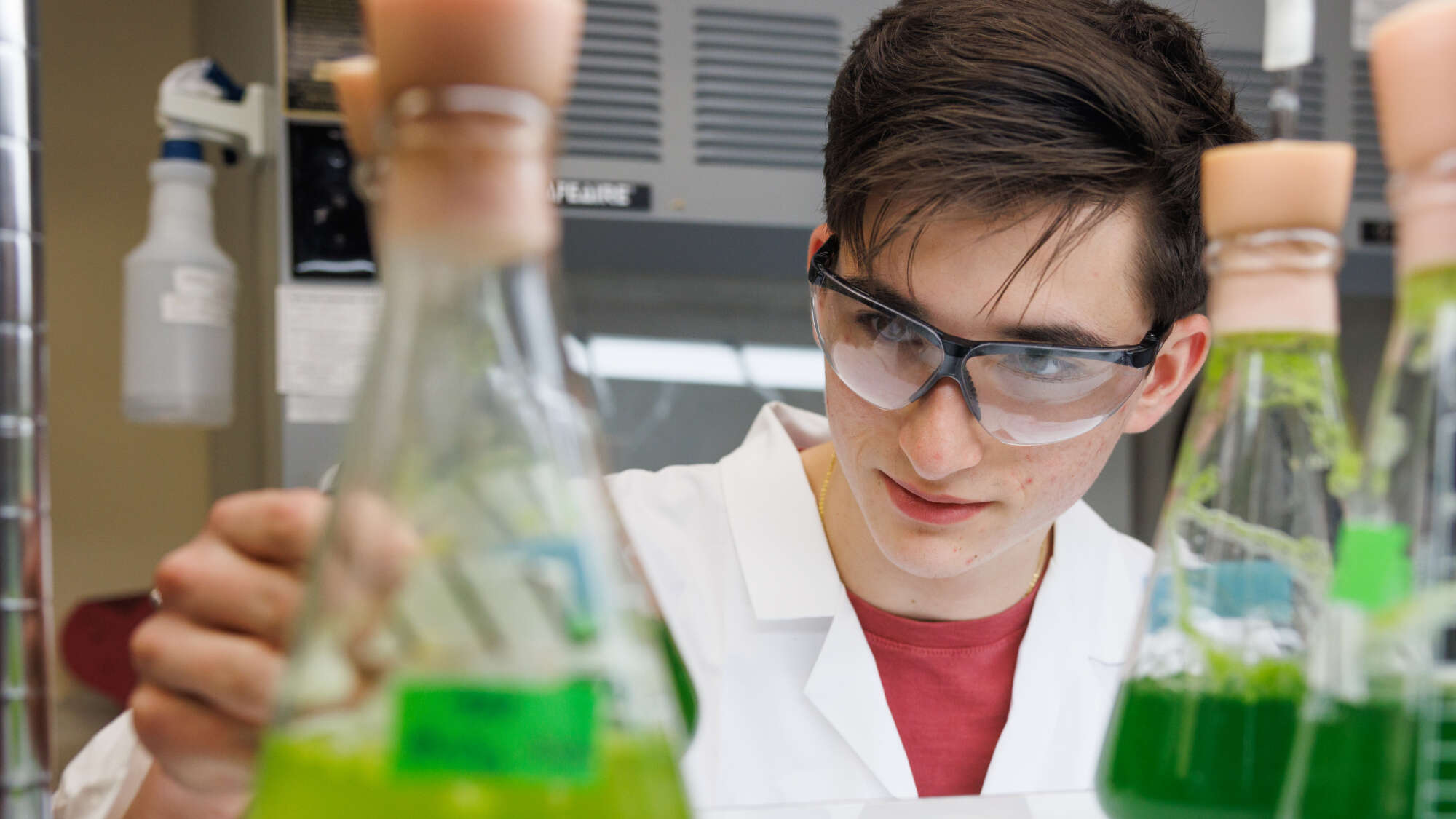 male student in lab